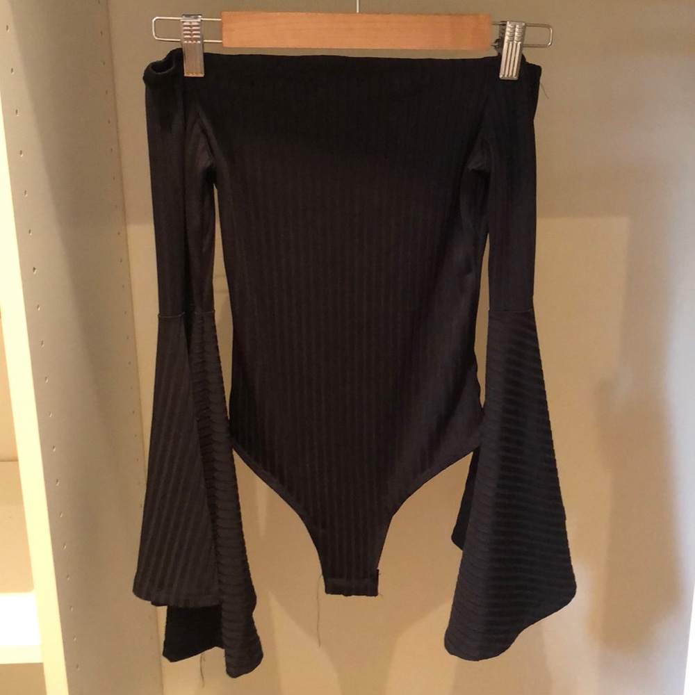 Black ribbed bell sleeve off-shoulder bodysuit